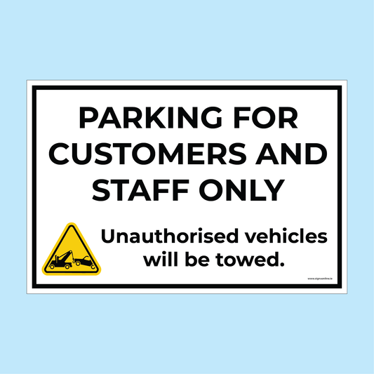 Parking sign for customers and staff only with unauthorized vehicle towing warning background