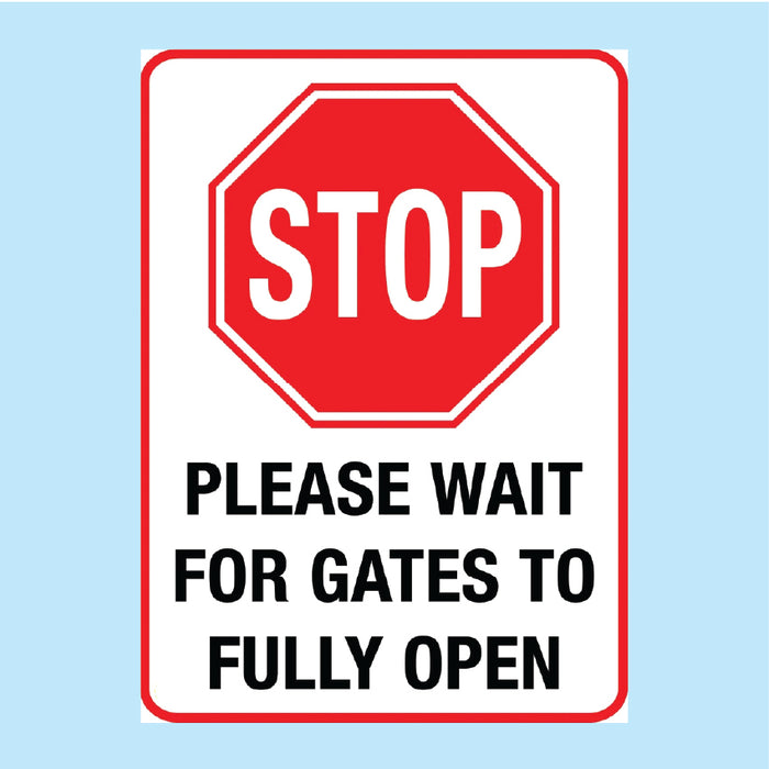 Stop. Wait for gates to open fully