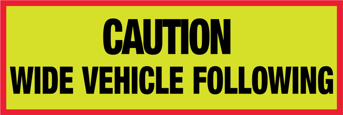 CAUTION WIDE VEHICLE FOLLOWING